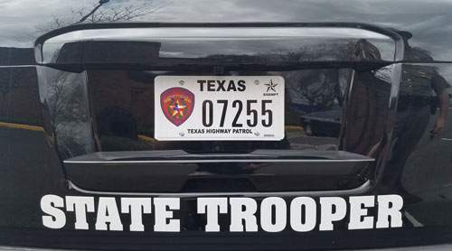 Texas police license plate on car